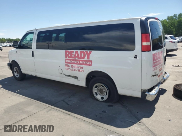 2015 Chevrolet Express Passenger LT with VIN 1GAZG1FG6F1217514, listed as a Copart auction lot 64759505 with 270,681 mi miles and Clean title. Bid and sale history available at DreamBid. Image 2.