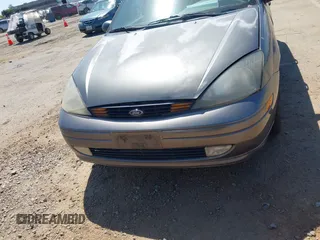 2003 Ford Focus ZTS with VIN 1FAFP38353W178144, listed as a IAAI auction lot 42039418 with 156,709 mi miles and . Bid and sale history available at carsss.com. Image 6.