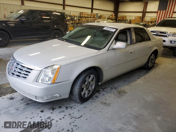 2007 Cadillac DTS V8 z VIN 1G6KD57YX7U201089, wystawiony jako Copart lot #44665825 z przebiegiem 117 048 mil mil oraz Szkoda całkowita • Salvage title. Historia ofert i sprzedaży dostępna na DreamBid. Obrazek 1.