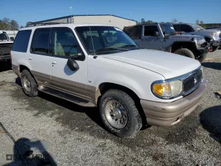 2000 Mercury Mountaineer with VIN 4M2ZU66P8YUJ40296, listed as a Copart auction lot 77108224 with 215,850 mi miles and Salvage Title. Bid and sale history available at carsss.com. Image 4.