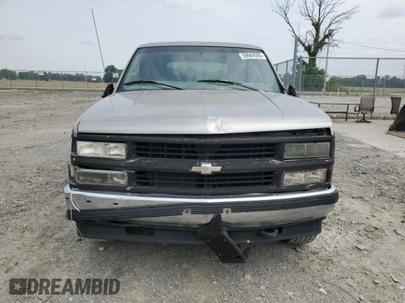 1999 Chevrolet Tahoe Z71 with VIN 1GNEK13R6XJ301562, listed as a Copart auction lot 59684595 with 200,561 mi miles and Salvage title. Bid and sale history available at DreamBid. Image 5.