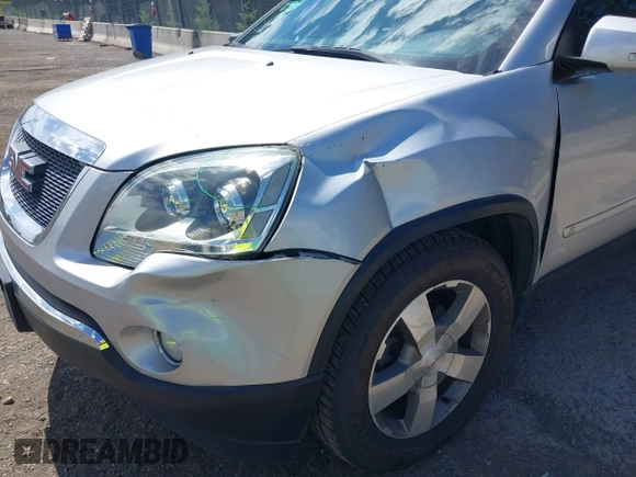 2010 GMC Acadia SLT1 z VIN 1GKLVMED1AJ139006, wystawiony jako IAAI lot #42232651 z przebiegiem 156 158 mil mil oraz . Historia ofert i sprzedaży dostępna na DreamBid. Obrazek 6.