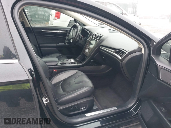 2018 Ford Fusion Titanium with VIN 3FA6P0RU7JR182119, listed as a IAAI auction lot 41984816 with 146,748 mi miles and . Bid and sale history available at DreamBid. Image 5.