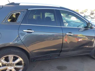 2013 Cadillac SRX Premium Collection z VIN 3GYFNEE37DS525612, wystawiony jako IAAI lot #41344221 z przebiegiem 119 573 mil mil oraz . Historia ofert i sprzedaży dostępna na DreamBid. Obrazek 6.