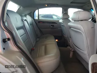 2000 Lincoln Town Car Signature z VIN 1LNHM82W3YY914145, wystawiony jako Copart lot #56040705 z przebiegiem 130 438 mil mil oraz Szkody całkowita. Historia ofert i sprzedaży dostępna na DreamBid. Obrazek 10.