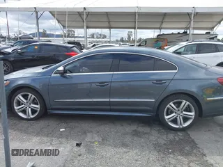 2013 Volkswagen CC Sport with VIN WVWBP7AN3DE571837, listed as a IAAI auction lot 41784447 with 156,834 mi miles. Bid and sale history available at carsss.com. Image 14.