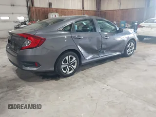 2016 Honda Civic Sedan LX with VIN 19XFC2F58GE214672, listed as a IAAI auction lot 42067792 with 73,929 mi miles. Bid and sale history available at carsss.com. Image 4.