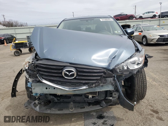 2016 Mazda CX-5 Touring with VIN JM3KE4CY9G0647226, listed as a Copart auction lot 51566405 with 77,785 mi miles and Salvage Title. Bid and sale history available at carsss.com. Image 5.