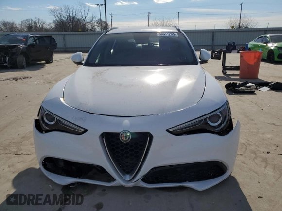2019 Alfa Romeo Stelvio z VIN ZASPAJAN1K7C36301, wystawiony jako Copart lot #88811295 z przebiegiem Nie podano mil oraz Szkoda całkowita • Salvage title. Historia ofert i sprzedaży dostępna na DreamBid. Obrazek 5.