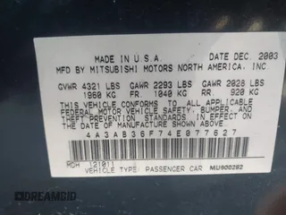 2004 Mitsubishi Galant ES with VIN 4A3AB36F74E077627, listed as a IAAI auction lot 41734910 with 196,299 mi miles. Bid and sale history available at carsss.com. Image 9.