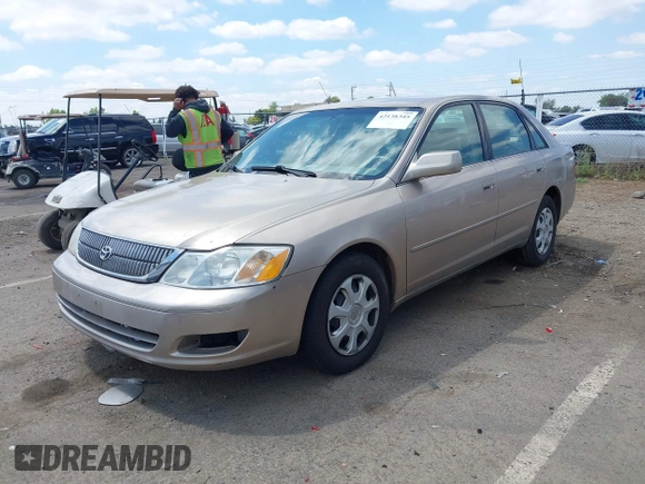 2001 Toyota Avalon XL w/Bucket Seats with VIN 4T1BF28B61U185881, listed as a IAAI auction lot 42138345 with 242,195 mi miles. Bid and sale history available at carsss.com. Image 2.