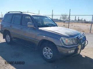 2000 Lexus LX with VIN JT6HT00WXY0079873, listed as a IAAI auction lot 41605770 with 302,758 mi miles. Bid and sale history available at carsss.com. Image 1.