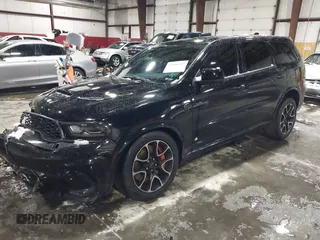 2023 Dodge Durango SRT Hellcat Premium z VIN 1C4SDJH90PC596225, wystawiony jako IAAI lot #41600943 z przebiegiem 18 877 mil mil oraz . Historia ofert i sprzedaży dostępna na DreamBid. Obrazek 18.
