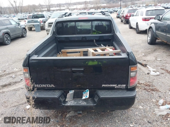2007 Honda Ridgeline RTL z VIN 2HJYK16527H510681, wystawiony jako IAAI lot #40920924 z przebiegiem Nie podano mil oraz . Historia ofert i sprzedaży dostępna na DreamBid. Obrazek 16.