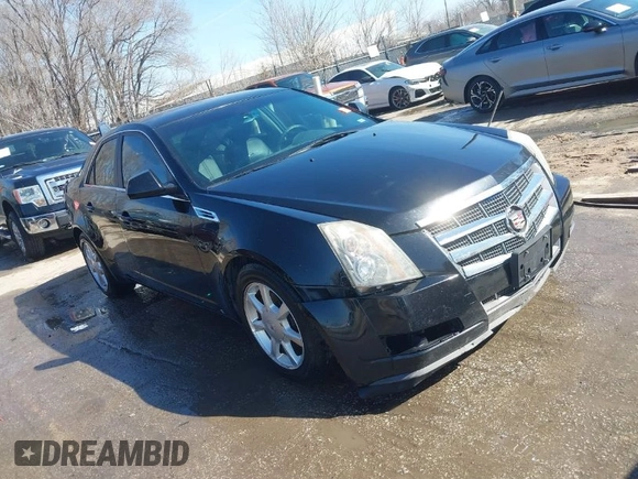 2009 Cadillac CTS AWD z VIN 1G6DH577290166448, wystawiony jako IAAI lot #41751610 z przebiegiem 158 378 mil mil oraz . Historia ofert i sprzedaży dostępna na DreamBid. Obrazek 1.