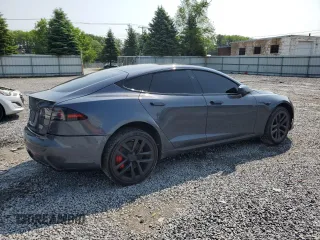 2023 Tesla Model S Plaid z VIN 5YJSA1E61PF518977, wystawiony jako Copart lot #60391625 z przebiegiem Nie podano mil oraz Szkoda całkowita • Salvage title. Historia ofert i sprzedaży dostępna na DreamBid. Obrazek 3.