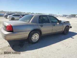2003 Ford Police Interceptor Street Appear z VIN 2FAFP71W03X104811, wystawiony jako Copart lot #49307995 z przebiegiem 242 937 mil mil oraz Szkoda całkowita • Salvage title. Historia ofert i sprzedaży dostępna na DreamBid. Obrazek 3.