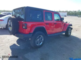 2019 Jeep Wrangler Unlimited Sahara with VIN 1C4HJXEG4KW551806, listed as a IAAI auction lot 41848718 with 97,690 mi miles. Bid and sale history available at carsss.com. Image 4.