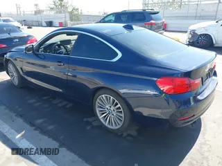 2016 BMW 4 Series 428i with VIN WBA3N7C59GK227052, listed as a IAAI auction lot 41643344 with 69,503 mi miles and . Bid and sale history available at carsss.com. Image 3.