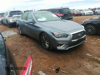2019 Infiniti Q50 Luxe z VIN JN1EV7AP0KM513825, wystawiony jako IAAI lot #41310796 z przebiegiem 92 131 mil mil oraz . Historia ofert i sprzedaży dostępna na DreamBid. Obrazek 1.