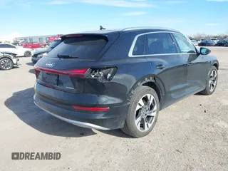2022 Audi e-tron Premium with VIN WA1AAAGE6NB030134, listed as a IAAI auction lot 41209620 with 27,848 mi miles. Bid and sale history available at carsss.com. Image 4.