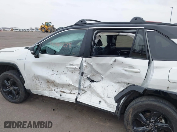 2021 Toyota RAV4 Hybrid XSE with VIN 2T3E6RFV4MW021009, listed as a IAAI auction lot 41940278 with 33,016 mi miles and . Bid and sale history available at DreamBid. Image 6.