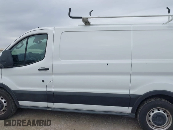 2020 Ford Transit Cargo with VIN 1FTYE1Y87LKA39598, listed as a IAAI auction lot 40989107 with 267,407 mi miles and . Bid and sale history available at DreamBid. Image 14.