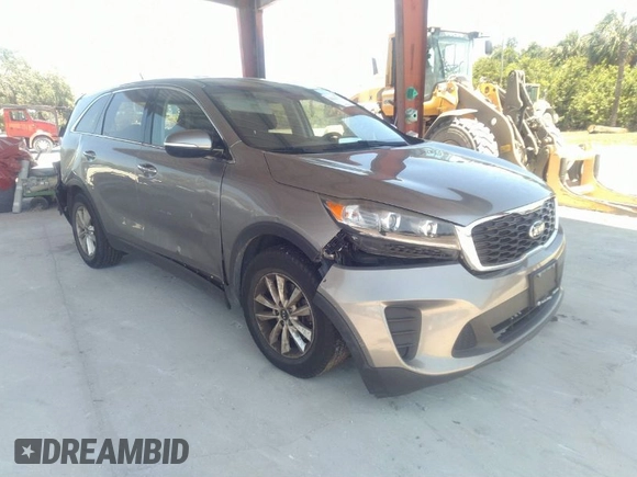 2019 Kia Sorento LX V6 with VIN 5XYPG4A52KG440780, listed as a IAAI auction lot 41673576 with 125,740 mi miles. Bid and sale history available at carsss.com. Image 1.