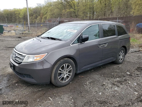 2012 Honda Odyssey EX-L with VIN 5FNRL5H62CB079729, listed as a Copart auction lot 52068685 with 181,468 mi miles and Salvage Title. Bid and sale history available at carsss.com. Image 1.