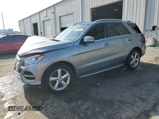 2016 Mercedes-Benz GLE 350 with VIN 4JGDA5JBXGA719672, listed as a Copart auction lot 61145845 with 105,386 mi miles and Salvage title. Bid and sale history available at DreamBid. Image 1.