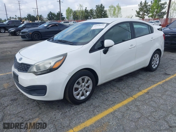 2012 Kia Rio LX with VIN KNADM4A31C6089842, listed as a IAAI auction lot 41928559 with 129,030 mi miles. Bid and sale history available at carsss.com. Image 2.