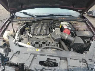 2012 Ford Fusion SEL with VIN 3FAHP0JG1CR358874, listed as a Copart auction lot 86041954 with 59,964 mi miles and Salvage Title. Bid and sale history available at DreamBid. Image 11.