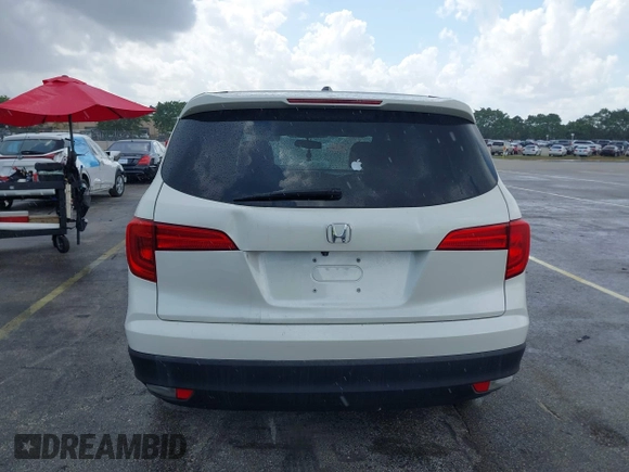 2016 Honda Pilot EX-L with VIN 5FNYF5H50GB043294, listed as a IAAI auction lot 41930654 with 92,728 mi miles and . Bid and sale history available at DreamBid. Image 16.