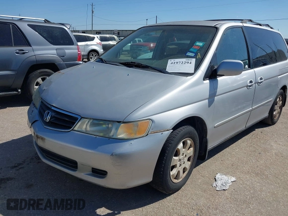 2002 Honda Odyssey EX-L z VIN 5FNRL18062B011890, wystawiony jako IAAI lot #41972294 z przebiegiem 245 889 mil mil oraz . Historia ofert i sprzedaży dostępna na DreamBid. Obrazek 2.