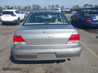 2003 Mitsubishi Lancer ES with VIN JA3AJ26E63U007501, listed as a IAAI auction lot 41771016 with 146,984 mi miles. Bid and sale history available at carsss.com. Image 16.