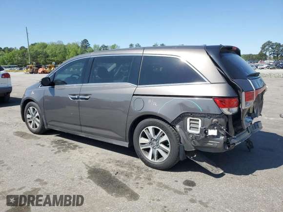 2016 Honda Odyssey Touring Elite with VIN 5FNRL5H91GB088163, listed as a Copart auction lot 50276495 with 197,274 mi miles and Salvage Title. Bid and sale history available at DreamBid. Image 2.