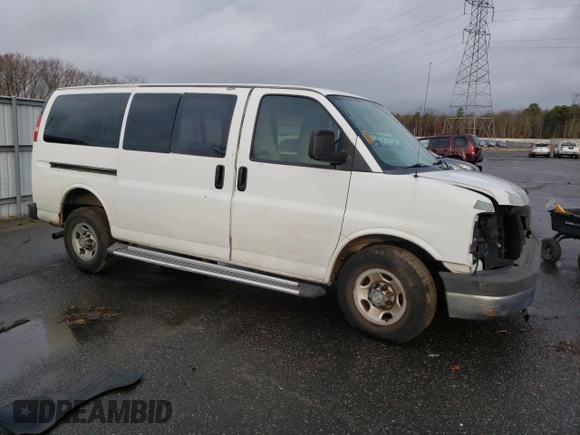 2012 Chevrolet Express Passenger 1LT with VIN 1GAZGYFG3C1118315, listed as a Copart auction lot 80870104 with 122,178 mi miles and Salvage title. Bid and sale history available at DreamBid. Image 4.