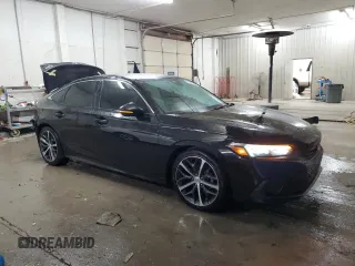 2022 Honda Civic Sedan Touring with VIN 2HGFE1F96NH317163, listed as a Copart auction lot 89190845 with 51,090 mi miles and Salvage Title. Bid and sale history available at carsss.com. Image 4.