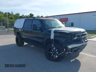 2003 Chevrolet Suburban LT z VIN 3GNGC26U13G199630, wystawiony jako IAAI lot #42344884 z przebiegiem 232 827 mil mil oraz . Historia ofert i sprzedaży dostępna na DreamBid. Obrazek 1.