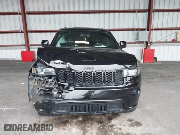 2019 Jeep Grand Cherokee Laredo E with VIN 1C4RJFAG0KC565739, listed as a IAAI auction lot 42039038 with 103,358 mi miles and . Bid and sale history available at DreamBid. Image 12.