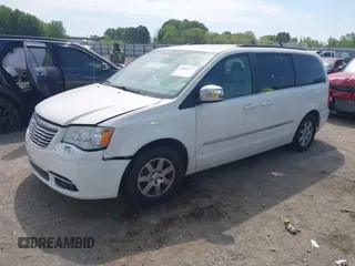 2012 Chrysler Town & Country Touring L with VIN 2C4RC1CG7CR156415, listed as a IAAI auction lot 42045371 with 233,306 mi miles and . Bid and sale history available at carsss.com. Image 2.