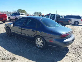 1998 Ford Taurus LX with VIN 1FAFP52U0WA226924, listed as a IAAI auction lot 41702083 with 55,998 mi miles. Bid and sale history available at carsss.com. Image 3.