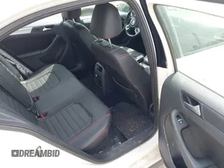2012 Volkswagen Jetta GLI Autobahn z VIN 3VW4A7AJ3CM409073, wystawiony jako IAAI lot #42360786 z przebiegiem 208 712 mil mil oraz . Historia ofert i sprzedaży dostępna na DreamBid. Obrazek 8.