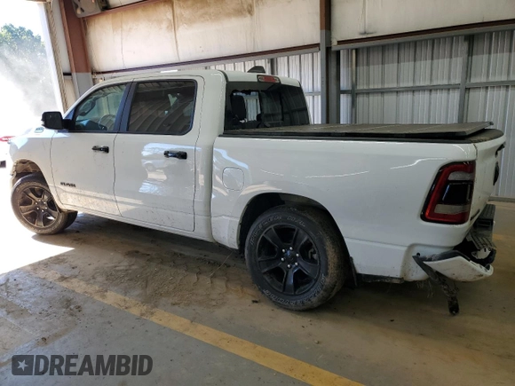 2023 Ram 1500 Big Horn with VIN 1C6RRFFGXPN666856, listed as a Copart auction lot 74139104 with 48,597 mi miles and Salvage title. Bid and sale history available at DreamBid. Image 2.