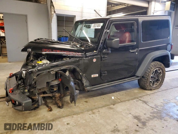 2013 Jeep Wrangler Rubicon with VIN 1C4HJWCG6DL666540, listed as a Copart auction lot 79337404 with 130,448 mi miles and Salvage title. Bid and sale history available at DreamBid. Image 1.