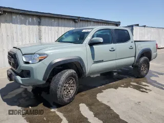 2023 Toyota Tacoma SR with VIN 3TMCZ5ANXPM580620, listed as a Copart auction lot 60230165 with 46,263 mi miles and Clean title. Bid and sale history available at DreamBid. Image 1.