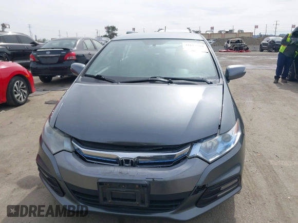 2012 Honda Insight EX z VIN JHMZE2H73CS000751, wystawiony jako IAAI lot #41687288 z przebiegiem 181 593 mil mil oraz . Historia ofert i sprzedaży dostępna na DreamBid. Obrazek 12.