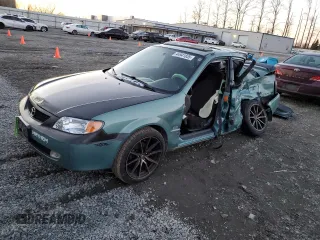 2001 Mazda Protege LX with VIN JM1BJ226510415089, listed as a Copart auction lot 44941835 with Not Provided miles and Salvage Title. Bid and sale history available at carsss.com. Image 1.