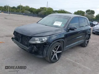 2014 Volkswagen Tiguan SE z VIN WVGAV3AXXEW535128, wystawiony jako IAAI lot #41882213 z przebiegiem 103 161 mil mil oraz . Historia ofert i sprzedaży dostępna na DreamBid. Obrazek 17.