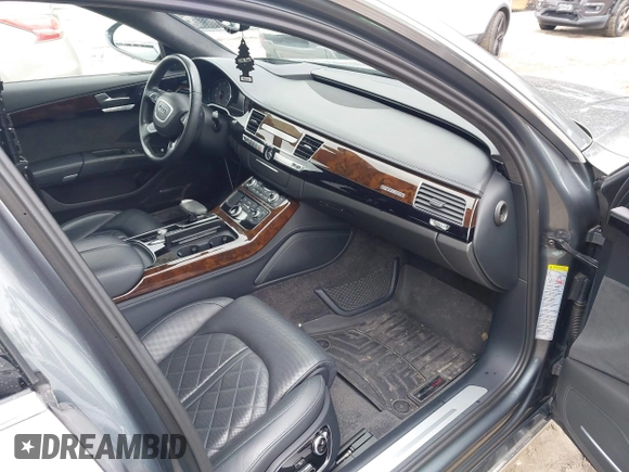 2015 Audi A8 3.0T z VIN WAU3GAFD5FN005065, wystawiony jako IAAI lot #41630450 z przebiegiem 122 939 mil mil oraz . Historia ofert i sprzedaży dostępna na DreamBid. Obrazek 5.